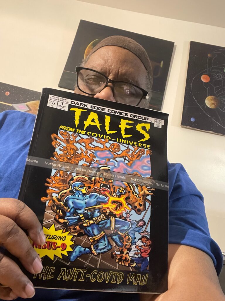 Bed-stuy-based comic book artist Winston Blakely with the comic book he created with the help of his RiseBoro Friendly Visitor volunteer.
