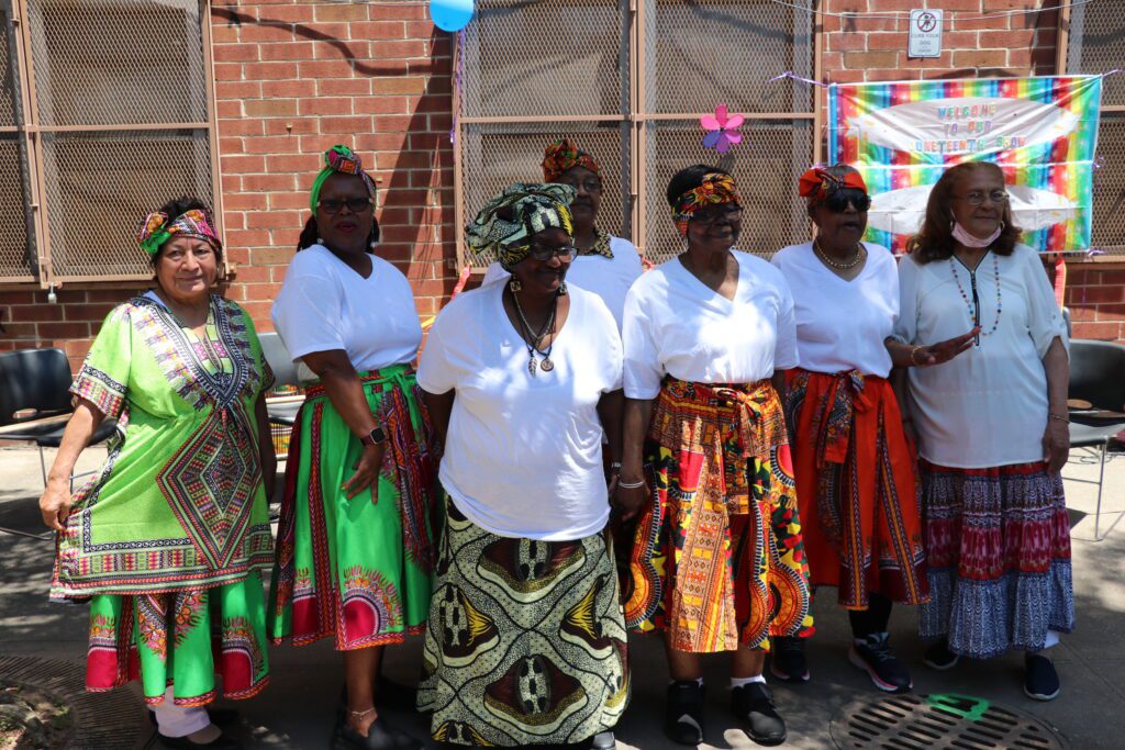 Members of RiseBoro's Stuyvesant Gardens Senior Club performed Afro-Caribbean dance at a Juneteenth festival in June 2022.