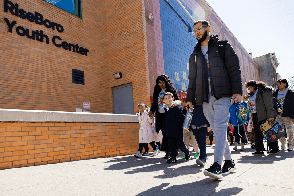 Children walking to RiseBoro's Youth Center