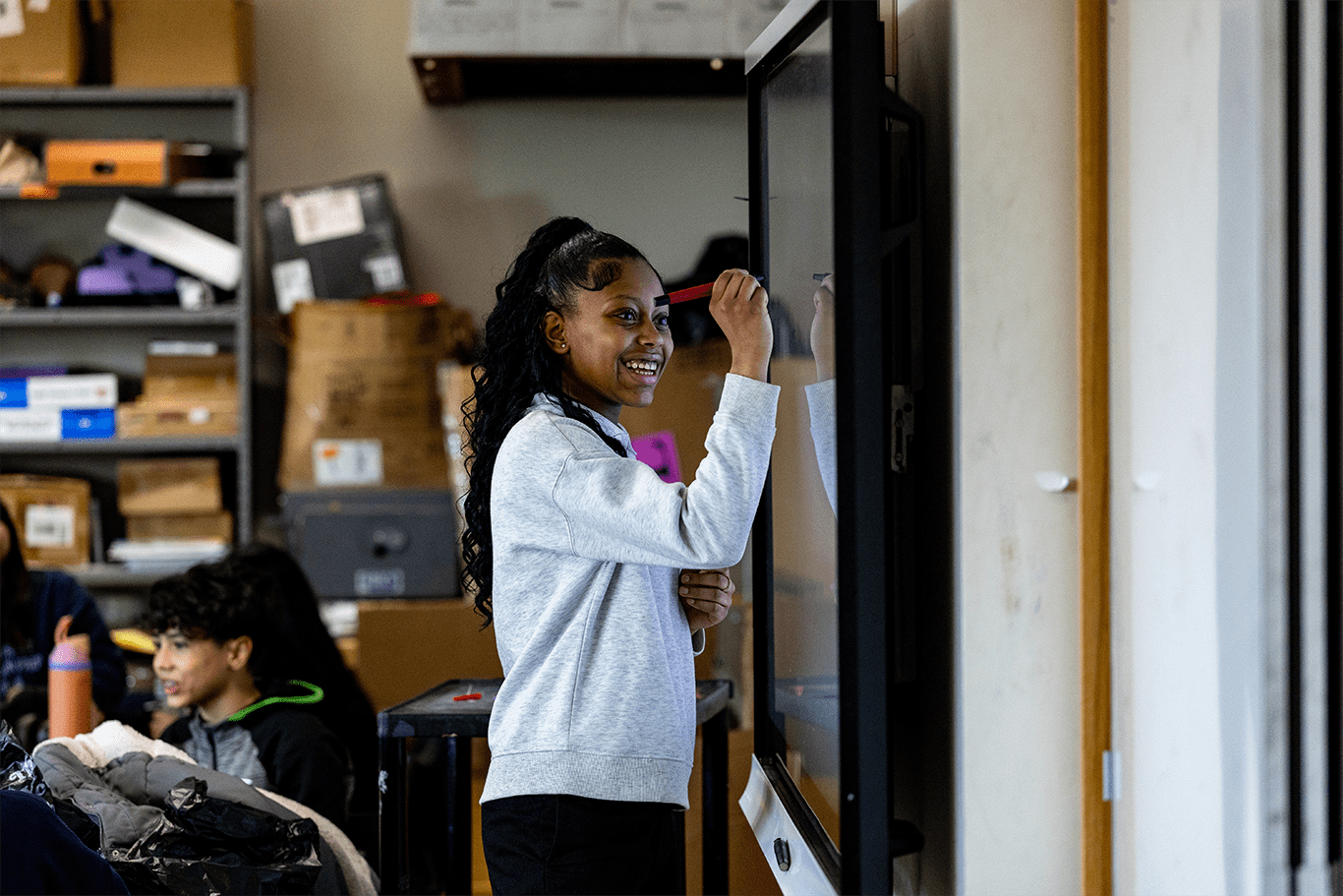 A student learning at RiseBoro's Youth Center